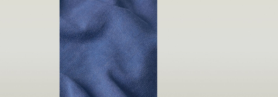 haut teint à fermeture éclair au dos