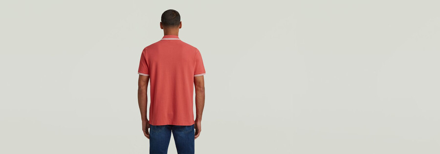 polo rayé avec logo sur la poitrine