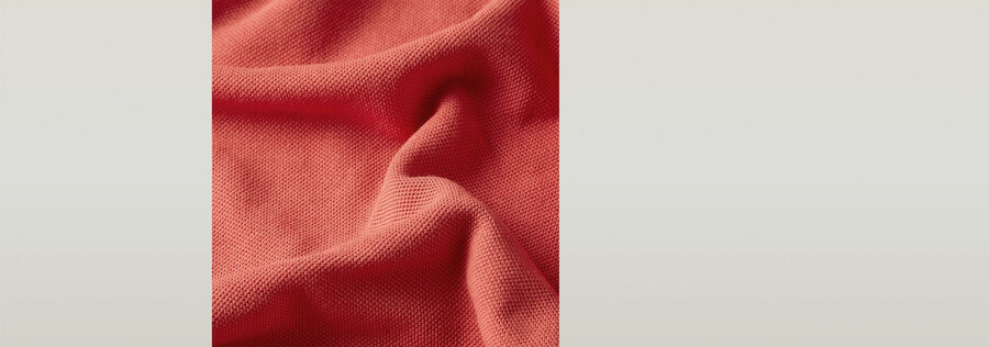 polo rayé avec logo sur la poitrine