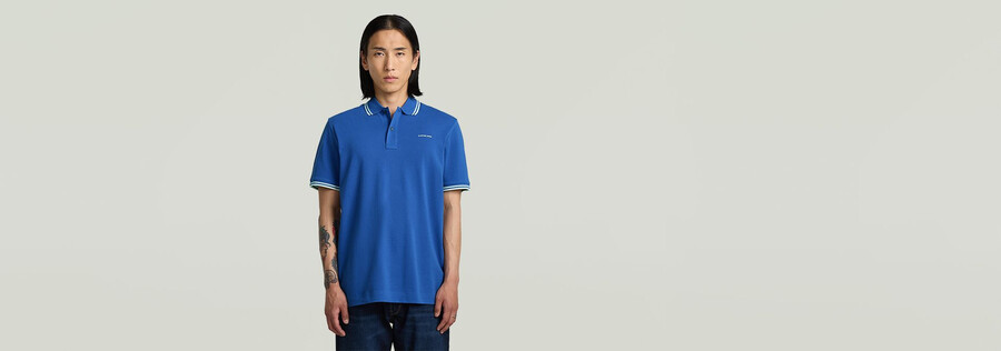polo rayé avec logo sur la poitrine