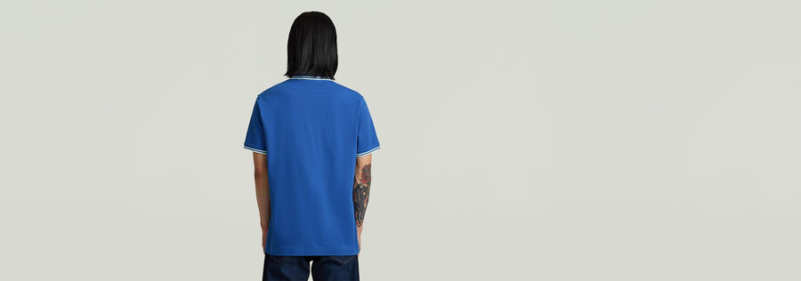 polo rayé avec logo sur la poitrine
