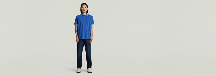 polo rayé avec logo sur la poitrine
