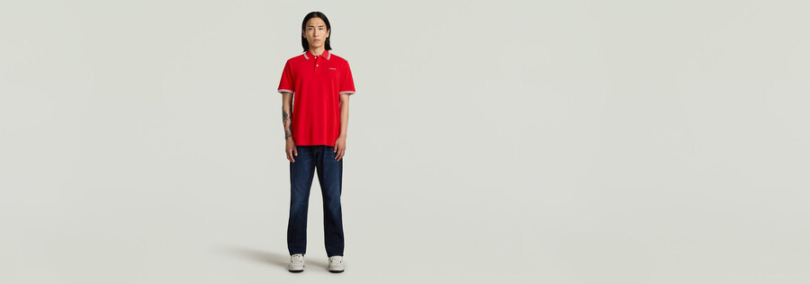 polo rayé avec logo sur la poitrine