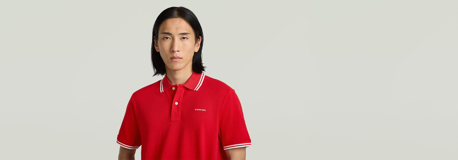 polo rayé avec logo sur la poitrine
