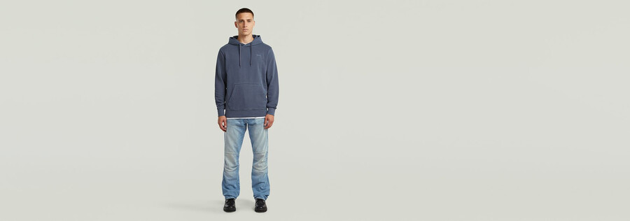 sweat à capuche teint avec logo