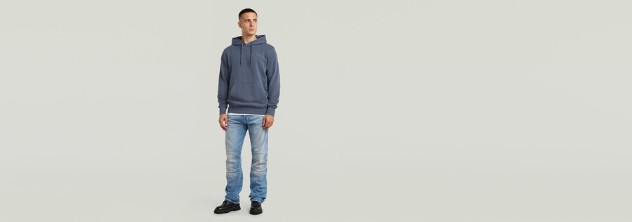 sweat à capuche teint avec logo